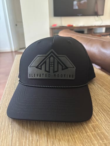 Customer photo review of Custom Leather Patch Trucker Hat - Richardson 355