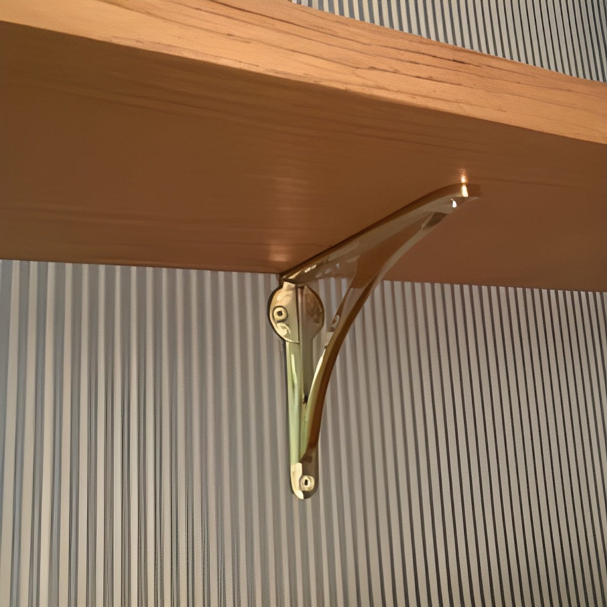 Customer photo review of Arched Shelf Bracket - Unlacquered Polished Brass