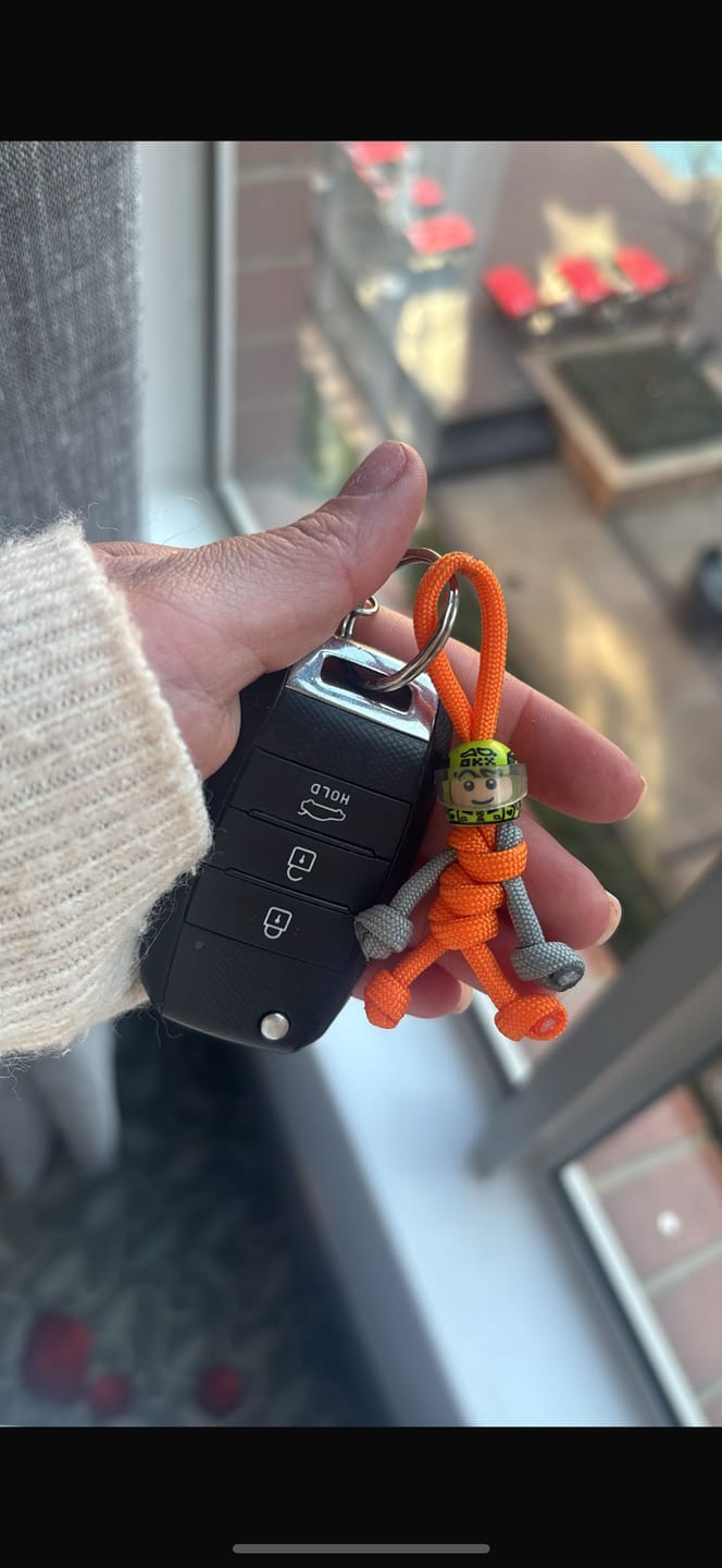 Customer photo review of Limited Edition 2025 Lando Norris Racing Paracord Buddy Keychain
