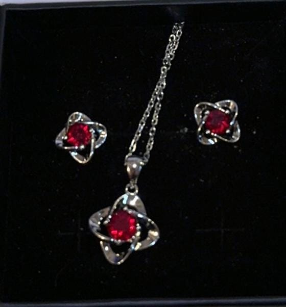 Customer photo review of Infinity 18k White Gold Plated Birthstone Flower Earrings with Swarovski Crystals