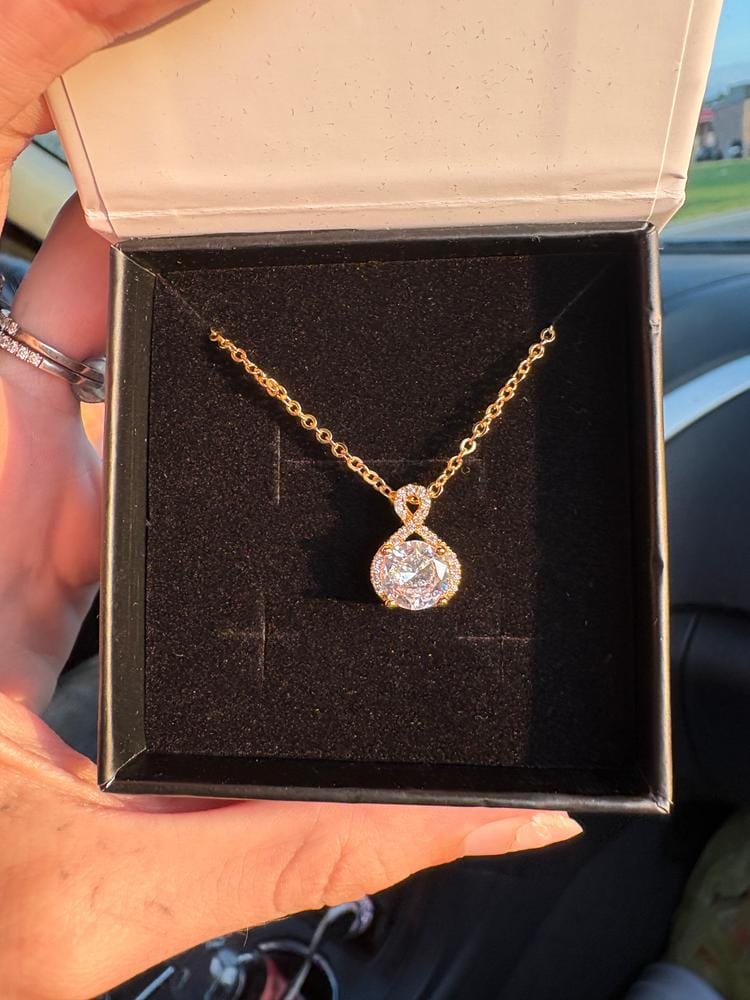 Customer photo review of Alessandra 18k White Gold Plated Infinity Halo Pendant Necklace with Simulated Diamond Crystals