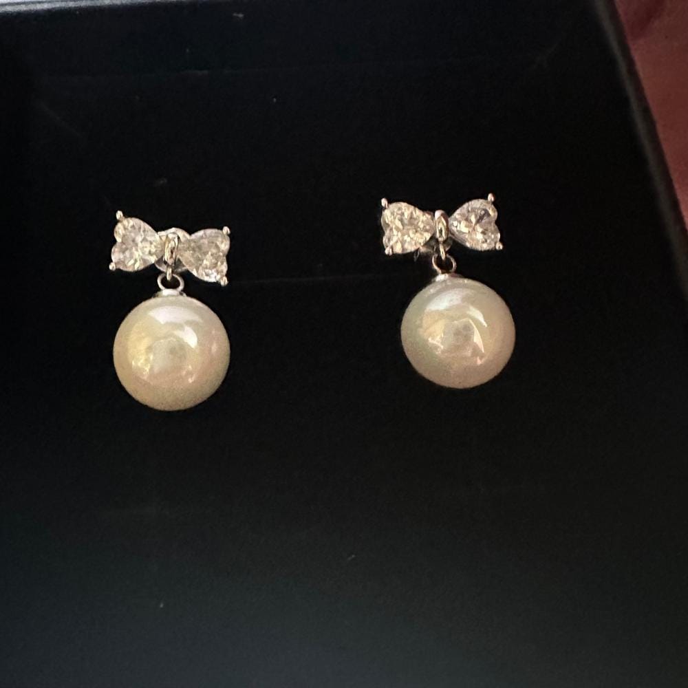 Customer photo review of Oakley 18k White Gold Plated Silver Drop Pearl Earrings with Swarovski Crystals