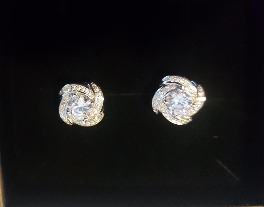 Customer photo review of Stella 18k White Gold Plated Stud Earrings with Simulated Diamond Crystals