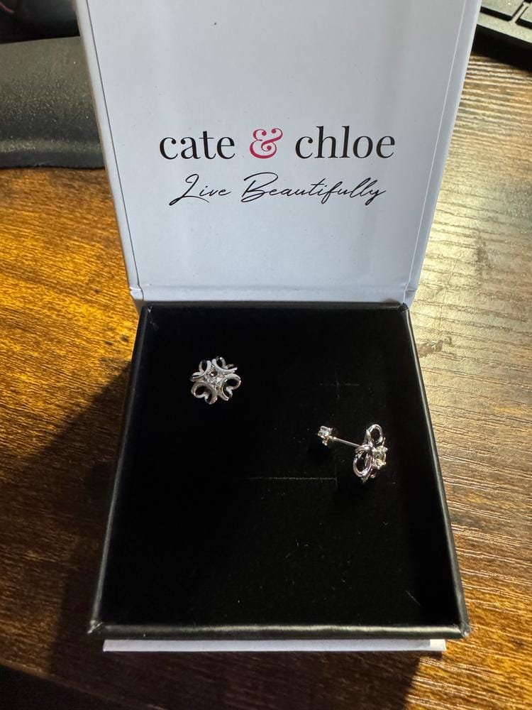 Customer photo review of Alexis 18k White Gold Plated Flower Stud Earrings with Swarovski Crystals
