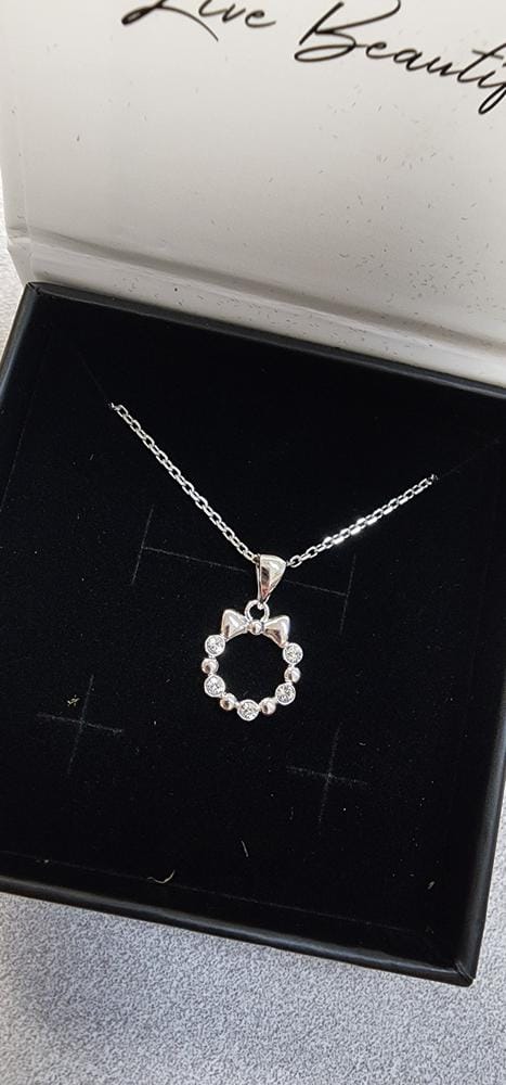 Customer photo review of Edith 18k White Gold Plated Silver Ribbon Necklace with Swarovski Crystals