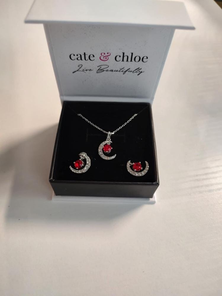 Customer photo review of Luna Birthstone Necklace 18k White Gold Plated Crescent Pendant Necklace with Round Cut Swarovski Crystals