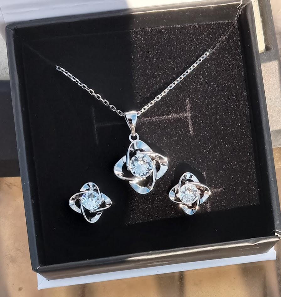 Customer photo review of Infinity 18k White Gold Plated Birthstone Flower Earrings with Swarovski Crystals