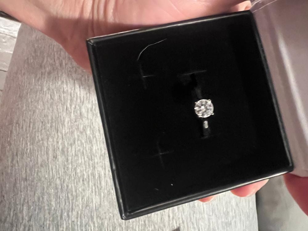 Customer photo review of Moissanite by Cate & Chloe Abigail 1.0tcw Round Cut 925 Sterling Silver 18k White Gold Plated Engagement Ring