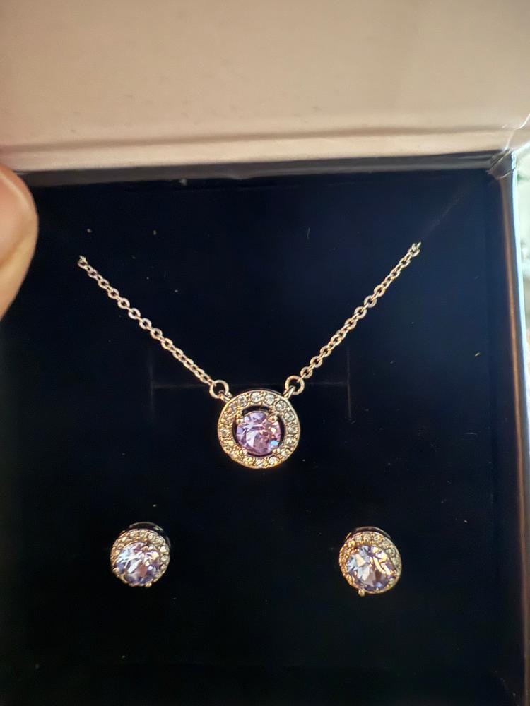 Customer photo review of Royal Birthstone 18k White Gold Plated Halo Stud Earrings with Round Cut Swarovski Crystals