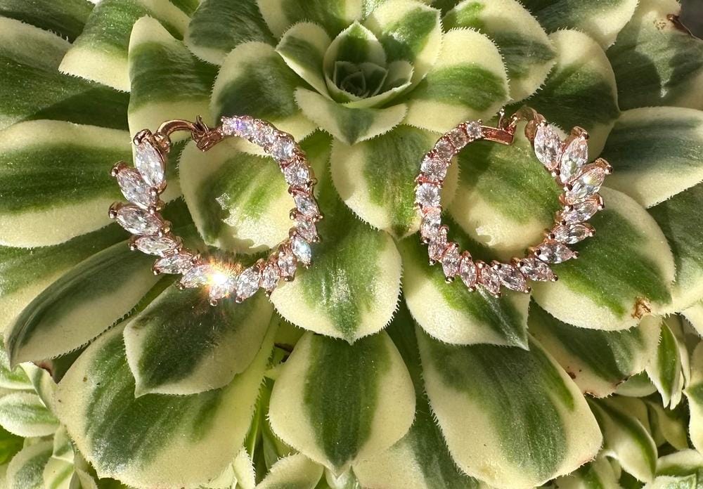 Customer photo review of Adelyn 18k Gold Plated Sideways Hoop Earrings with Simulated Diamond Crystals — Final Sale