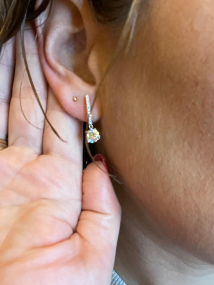 Customer photo review of Moissanite by Cate & Chloe Finley 18k Gold Plated 925 Sterling Silver Dangle Earrings 2.13tcw