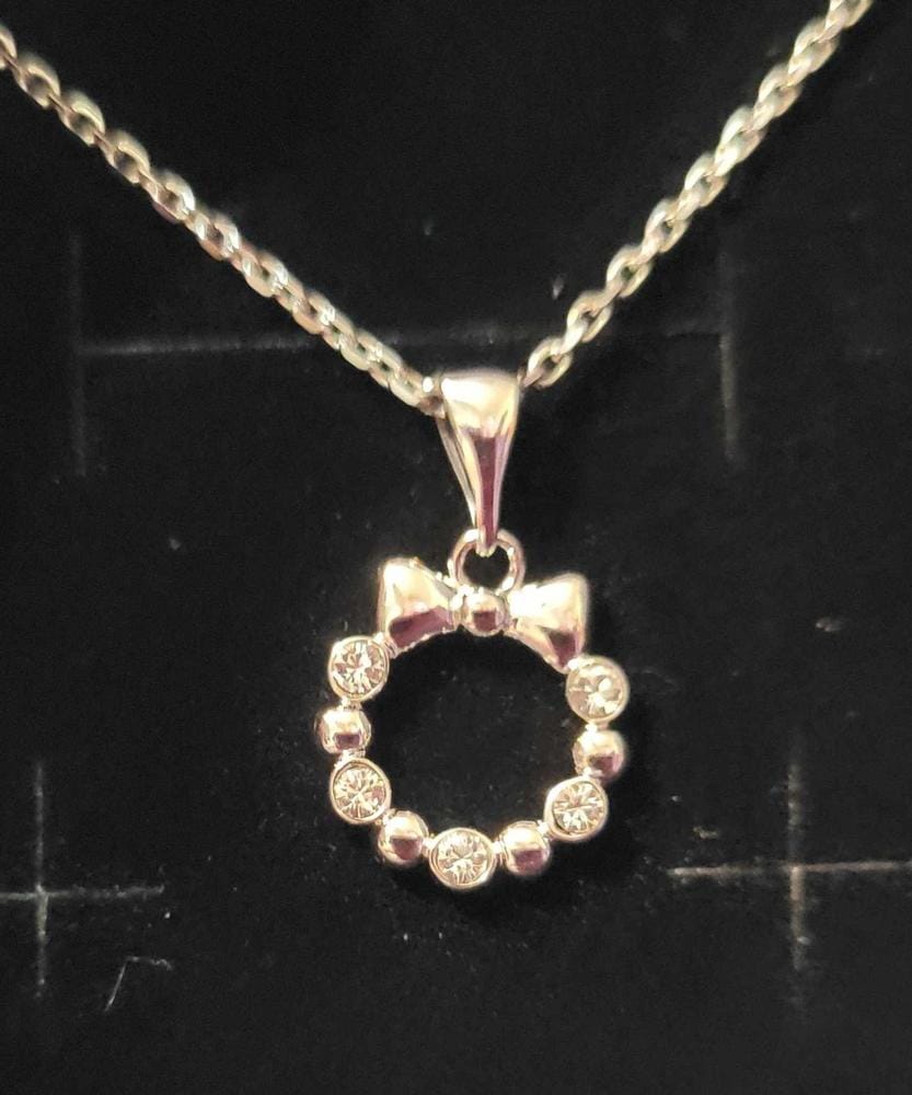 Customer photo review of Edith 18k White Gold Plated Silver Ribbon Necklace with Swarovski Crystals