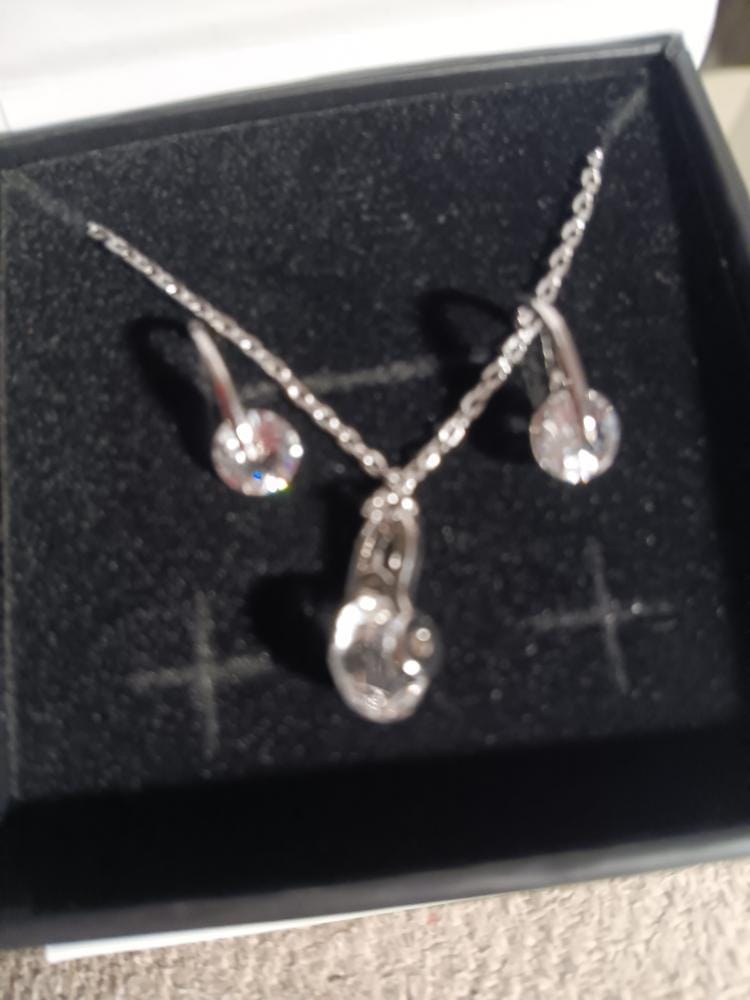Customer photo review of McKayla 18k White Gold Plated Drop Earrings with Swarovski Crystals