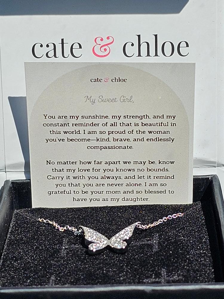 Customer photo review of Yuenen 18k White Gold Plated Butterfly Necklace with Swarovski Crystals & Heartfelt Message for Daughter