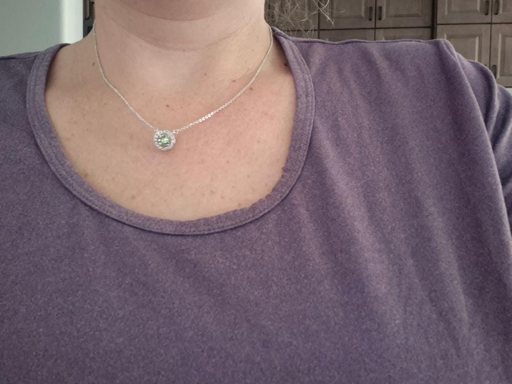 Customer photo review of Royal Birthstone 18k White Gold Plated Halo Stud Earrings with Round Cut Swarovski Crystals