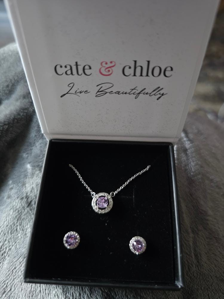 Customer photo review of Royal Birthstone 18k White Gold Plated Halo Stud Earrings with Round Cut Swarovski Crystals