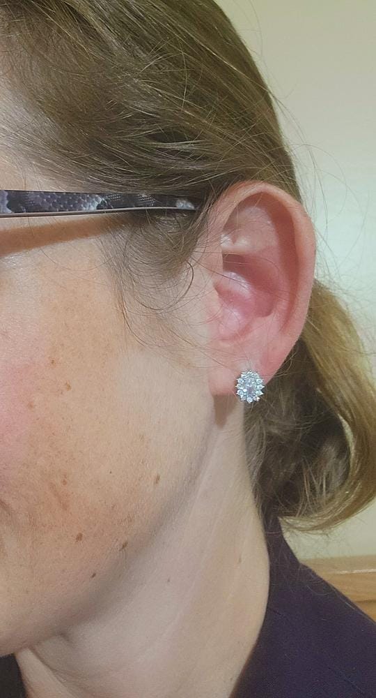 Customer photo review of Eloise 18k White Gold Plated Stud Earrings with Solitaire Round Cut Swarovski Crystal