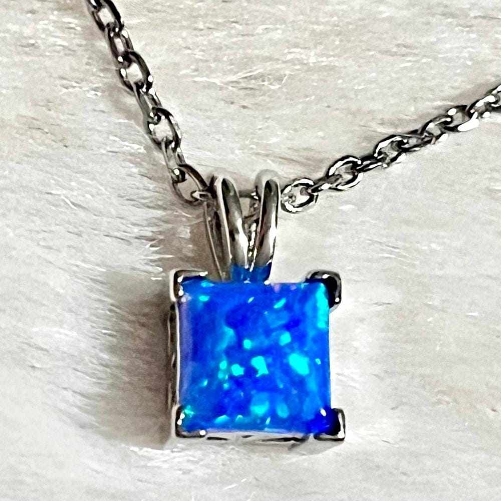 Customer photo review of Amphitrite 18k White Gold Plated Stud Earring and Necklace Set with Princess Cut Opal Stones