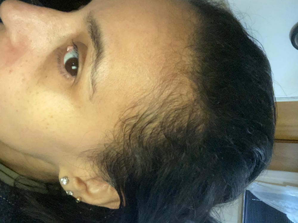 Customer photo review of Mallory 18k White Gold Plated Stud Earrings with Swarovski Crystals