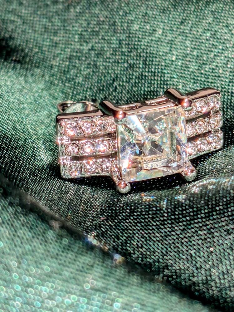Customer photo review of Fiona 18k White Gold Stud Plated Earrings with Princess Cut Swarovski Crystals