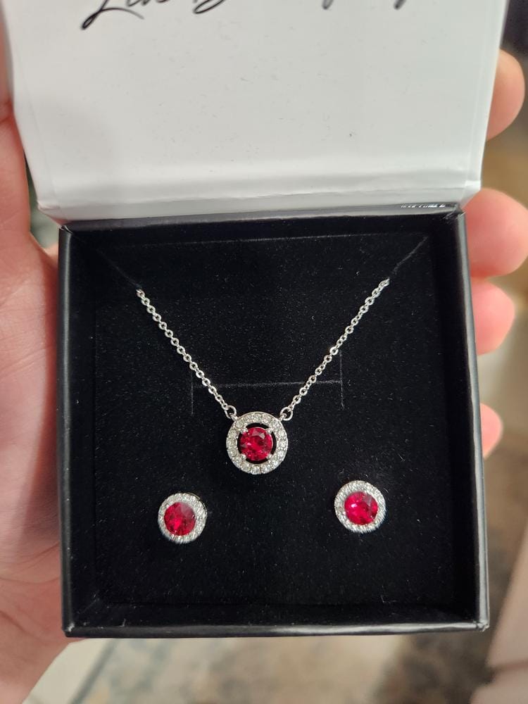 Customer photo review of Royal Birthstone 18k White Gold Plated Halo Stud Earrings with Round Cut Swarovski Crystals