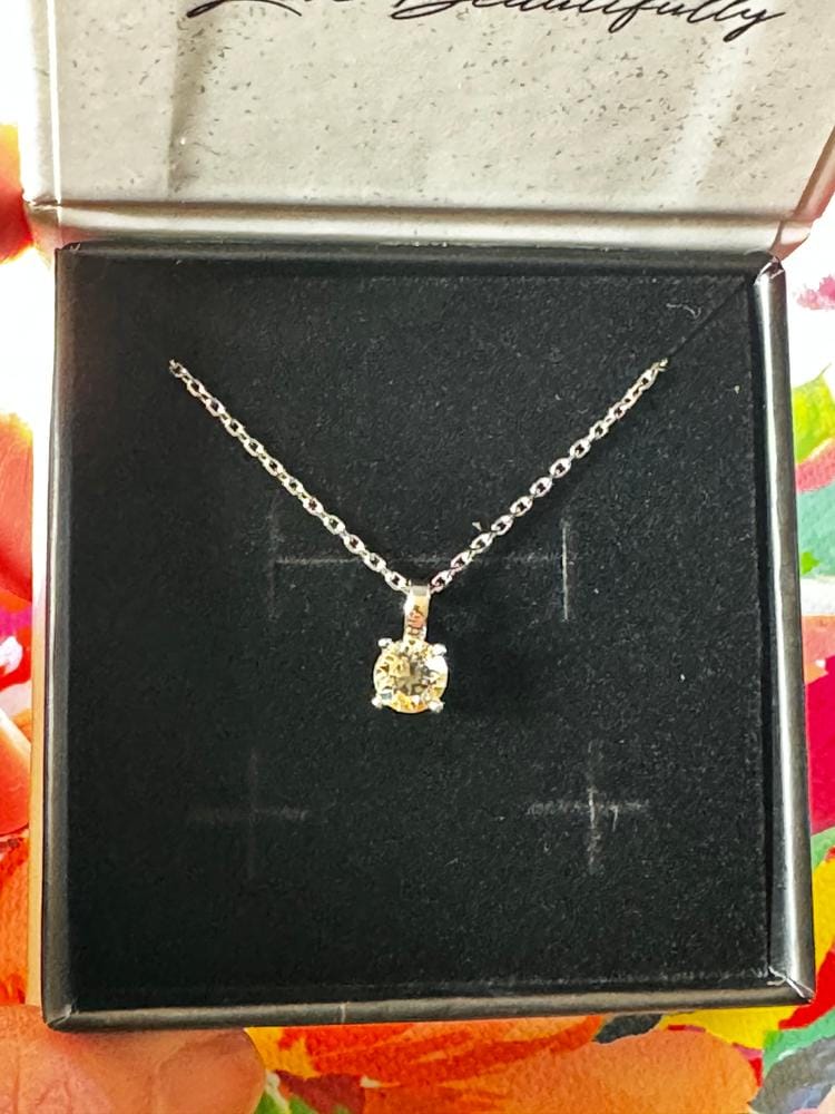 Customer photo review of Araylia 18k White Gold Plated Necklace with Solitaire Round Cut Swarovski Crystal