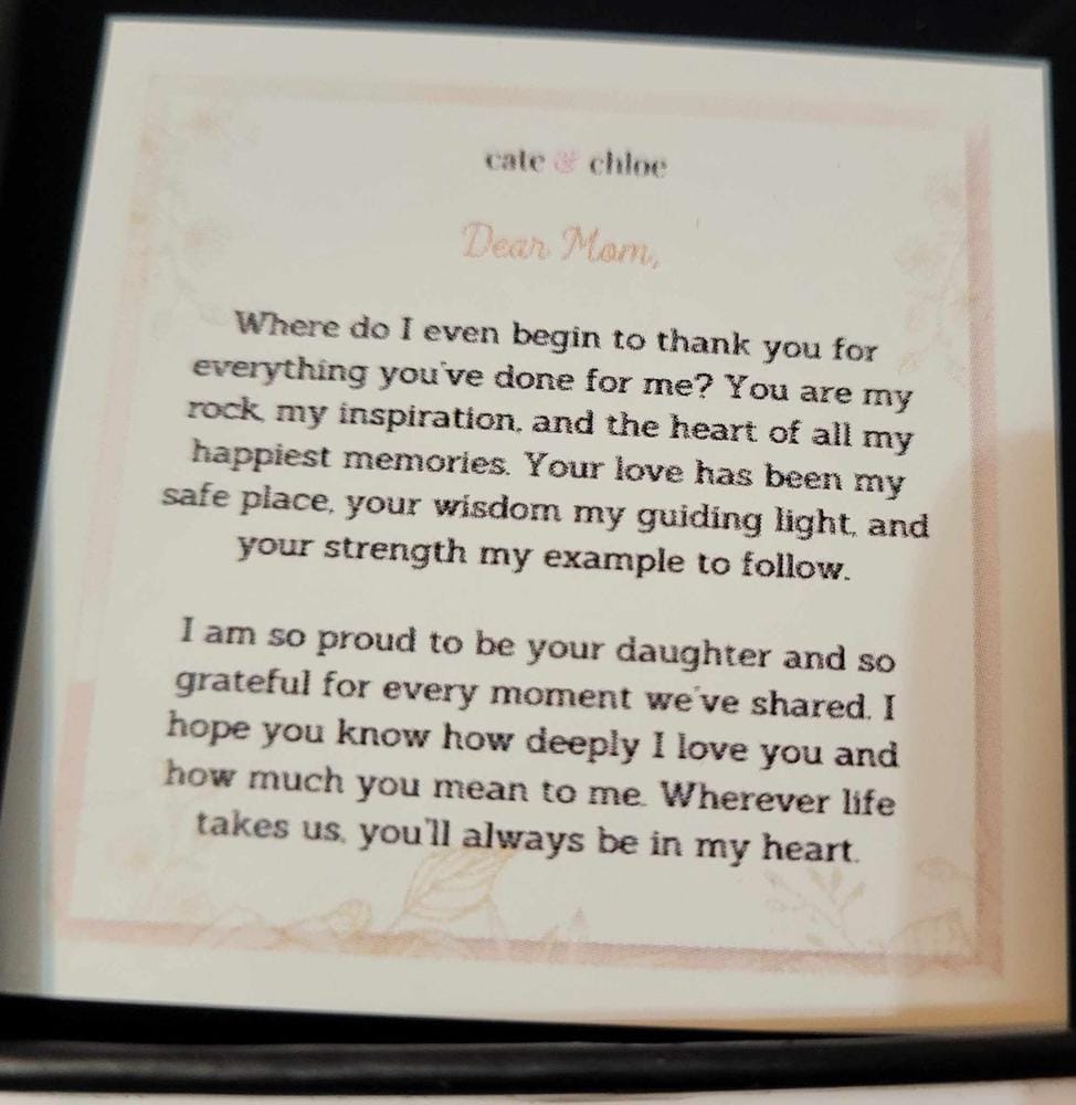 Customer photo review of Amorette 18k White Gold Plated Double Heart Pendant Necklace with Simulated Diamond Crystals & Heartfelt Message for Mom