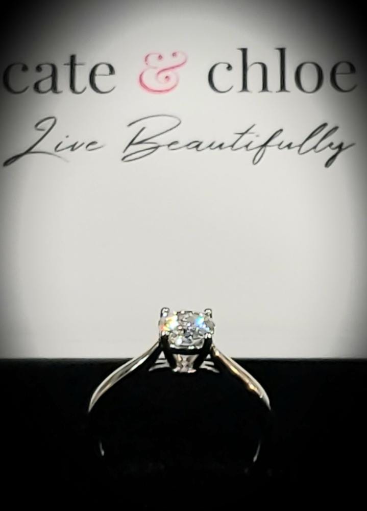 Customer photo review of Moissanite by Cate & Chloe Abigail 1.0tcw Round Cut 925 Sterling Silver 18k White Gold Plated Engagement Ring