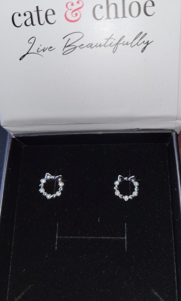 Customer photo review of Edith 18k White Gold Plated Silver Ribbon Stud Earrings with Swarovski Crystals