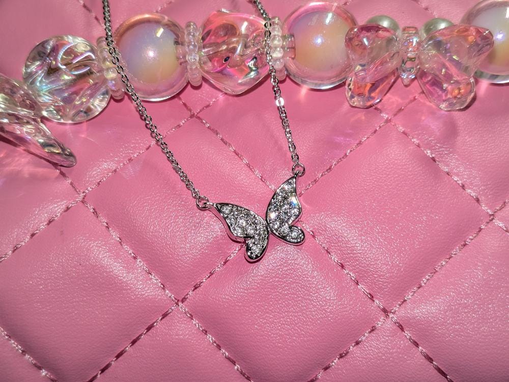 Customer photo review of Yuenen 18k White Gold Plated Silver Butterfly Necklace with Swarovski Crystals