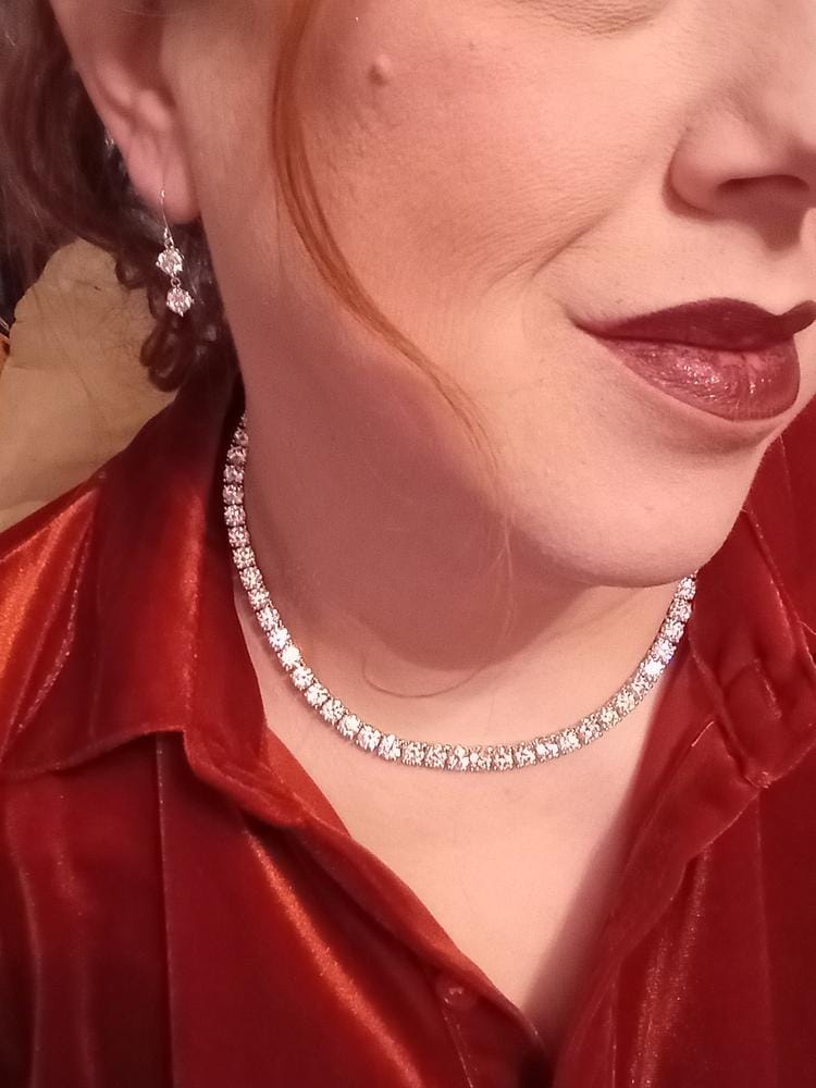 Customer photo review of Moissanite by Cate & Chloe Talia 18k Gold Plated 925 Sterling Silver Dangle Earrings 2.0tcw