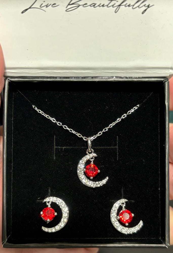 Customer photo review of Luna Birthstone Necklace 18k White Gold Plated Crescent Pendant Necklace with Round Cut Swarovski Crystals
