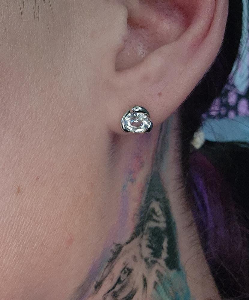 Customer photo review of Harmony 18k White Gold Plated Stud Earrings with Round Swarovski Crystals
