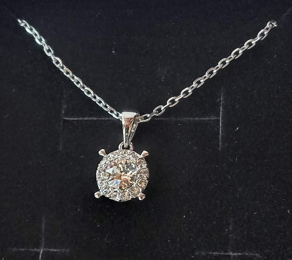 Customer photo review of Raylee 18k White Gold Plated Halo Pendant Necklace with Swarovski Crystals