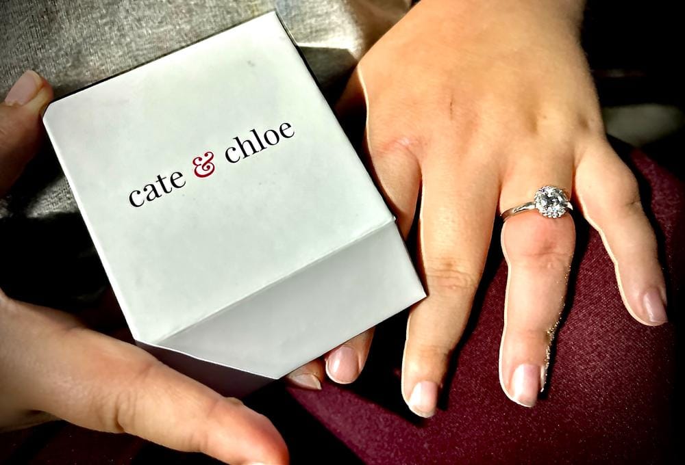 Customer photo review of Moissanite by Cate & Chloe Cora 1.1tcw Round Cut 925 Sterling Silver 18k White Gold Plated Forever Engagement Ring