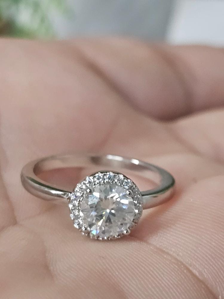 Customer photo review of Moissanite by Cate & Chloe Cora 1.1tcw Round Cut 925 Sterling Silver 18k White Gold Plated Forever Engagement Ring