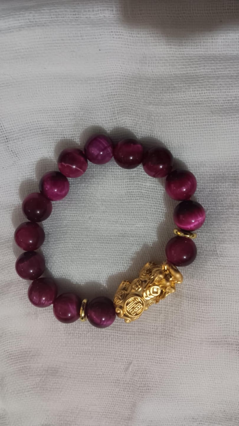Customer photo review of Magenta Tigers Eye w/ 24k PiYao for Money Love-Courage-Money Catcher