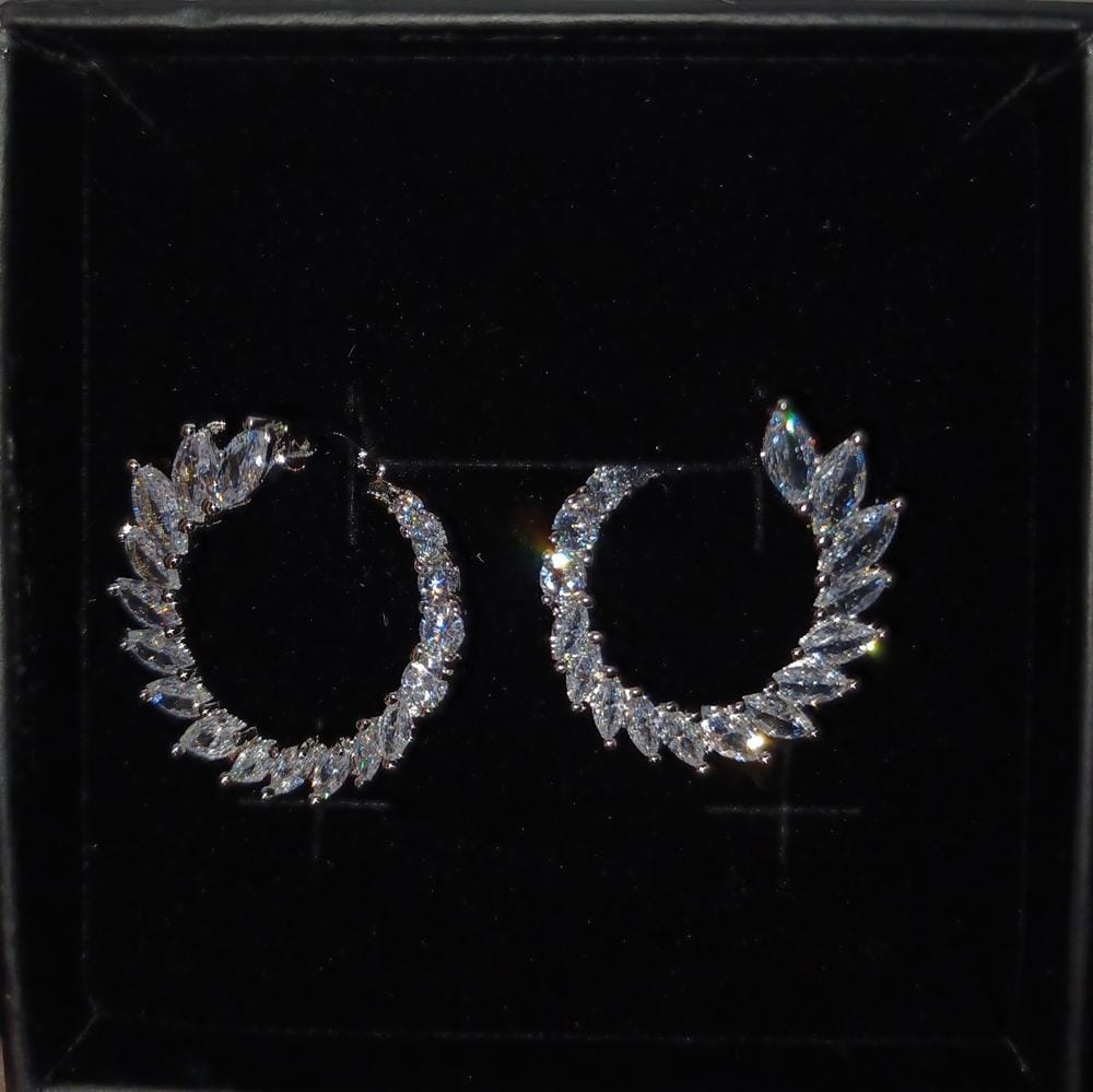 Customer photo review of Adelyn 18k Gold Plated Sideways Hoop Earrings with Simulated Diamond Crystals — Final Sale