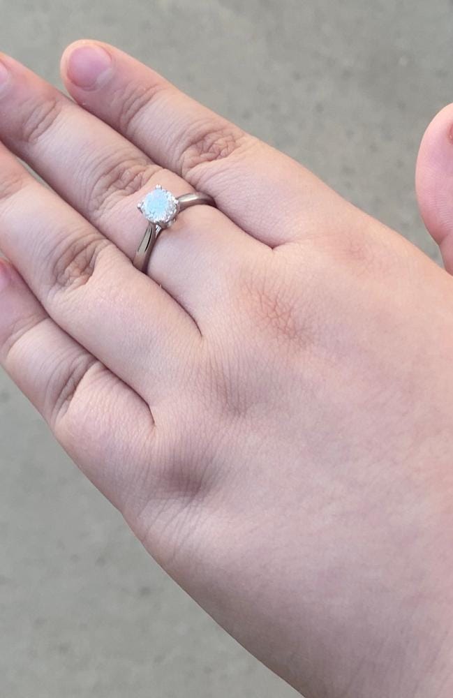 Customer photo review of Moissanite by Cate & Chloe Abigail 1.0tcw Round Cut 925 Sterling Silver 18k White Gold Plated Engagement Ring