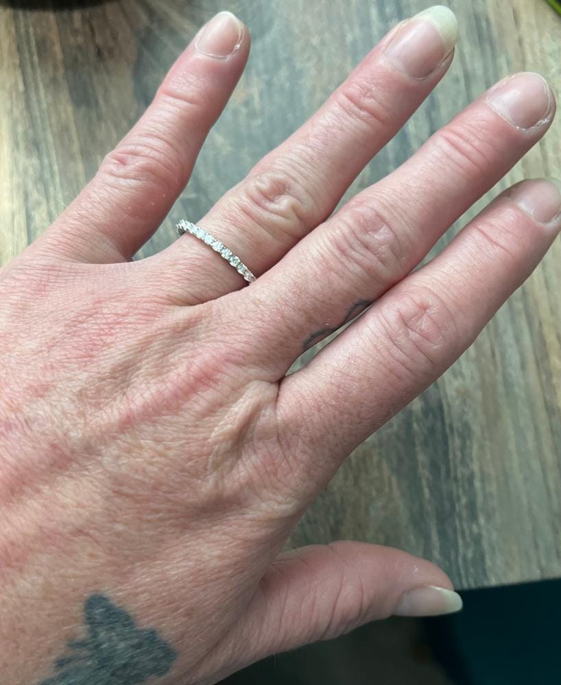 Customer photo review of Moissanite by Cate & Chloe Sadie 0.9tcw Round Cut 925 Sterling Silver 18k White Gold Plated Wedding Band