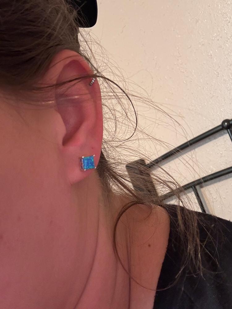 Customer photo review of Amphitrite 18k White Gold Plated Stud Earrings with Princess Cut Opal Stones