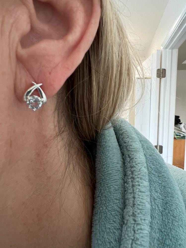 Customer photo review of Eloise 18k White Gold Plated Stud Earrings with Solitaire Round Cut Swarovski Crystal