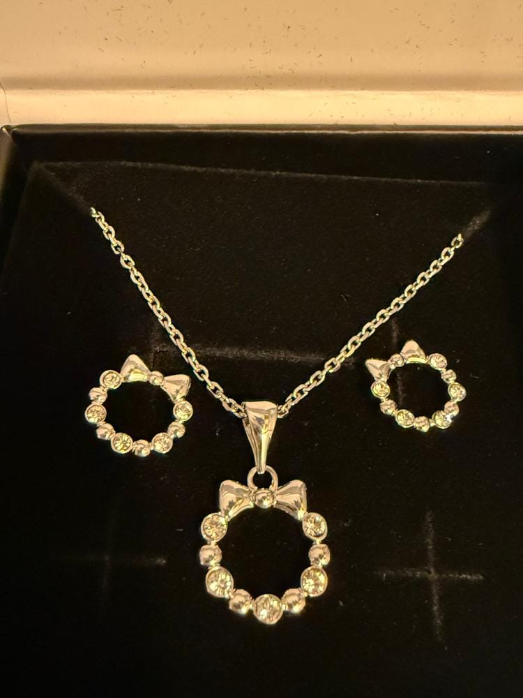 Customer photo review of Edith 18k White Gold Plated Silver Ribbon Necklace and Earring Set with Swarovski Crystals