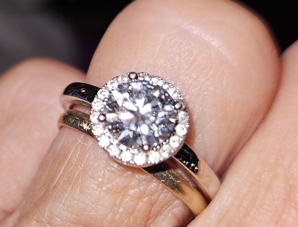 Customer photo review of Moissanite by Cate & Chloe Cora 1.1tcw Round Cut 925 Sterling Silver 18k White Gold Plated Forever Engagement Ring