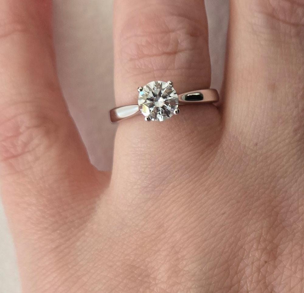 Customer photo review of Moissanite by Cate & Chloe Abigail 1.0tcw Round Cut 925 Sterling Silver 18k White Gold Plated Engagement Ring
