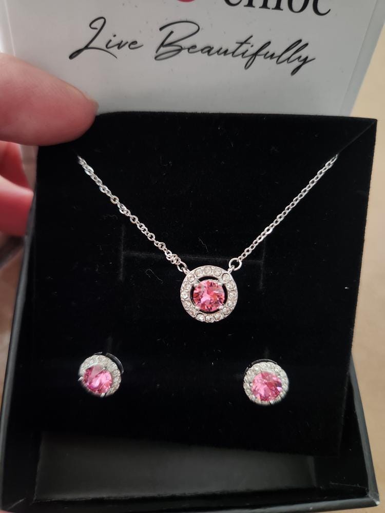 Customer photo review of Royal Birthstone 18k White Gold Plated Halo Stud Earrings with Round Cut Swarovski Crystals
