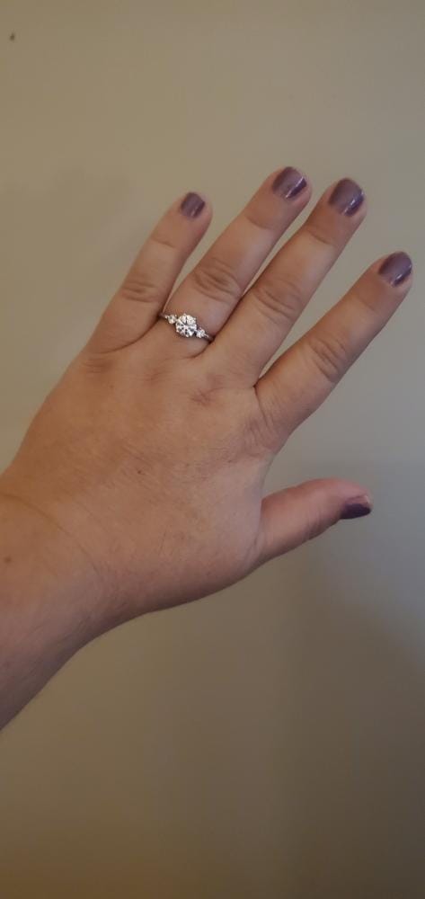 Customer photo review of Moissanite by Cate & Chloe Sarah 1.22tcw Round Cut 925 Sterling Silver 18k White Gold Plated Engagement Ring