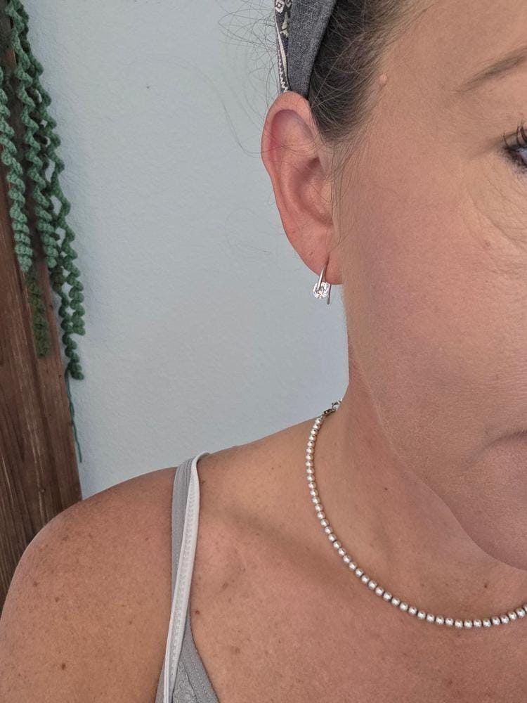 Customer photo review of McKayla 18k White Gold Plated Drop Earrings with Swarovski Crystals
