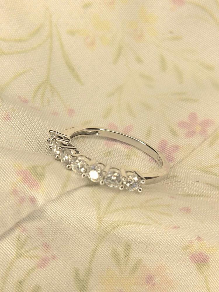 Customer photo review of Moissanite by Cate & Chloe Josephine 0.77tcw Round Cut 925 Sterling Silver 18k White Gold Plated Wedding Band