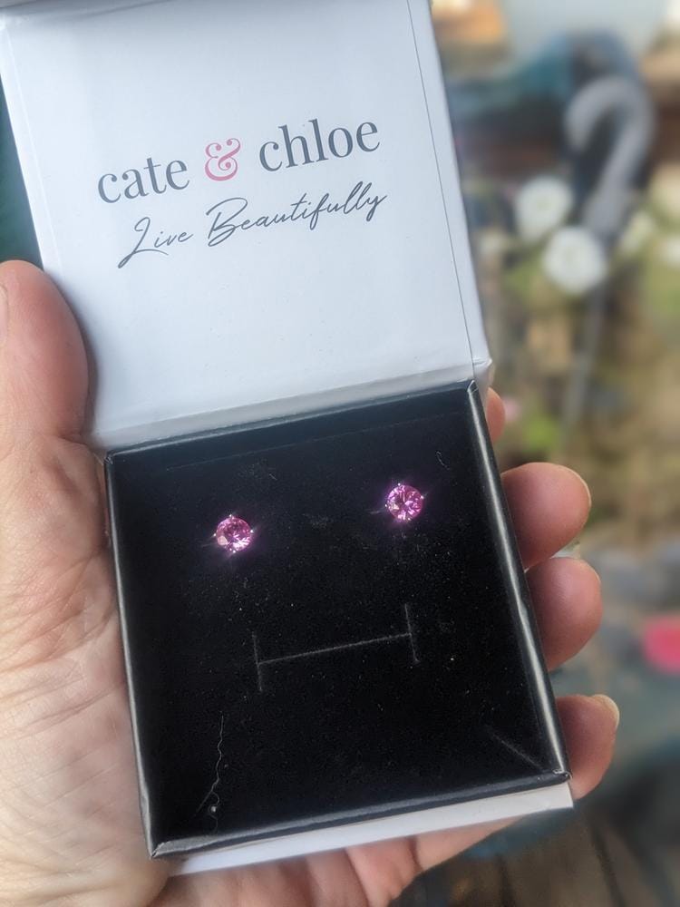 Customer photo review of Magnolia 18k White Gold Plated Solitaire Stud Earrings with 1ct Simulated Diamond Crystals